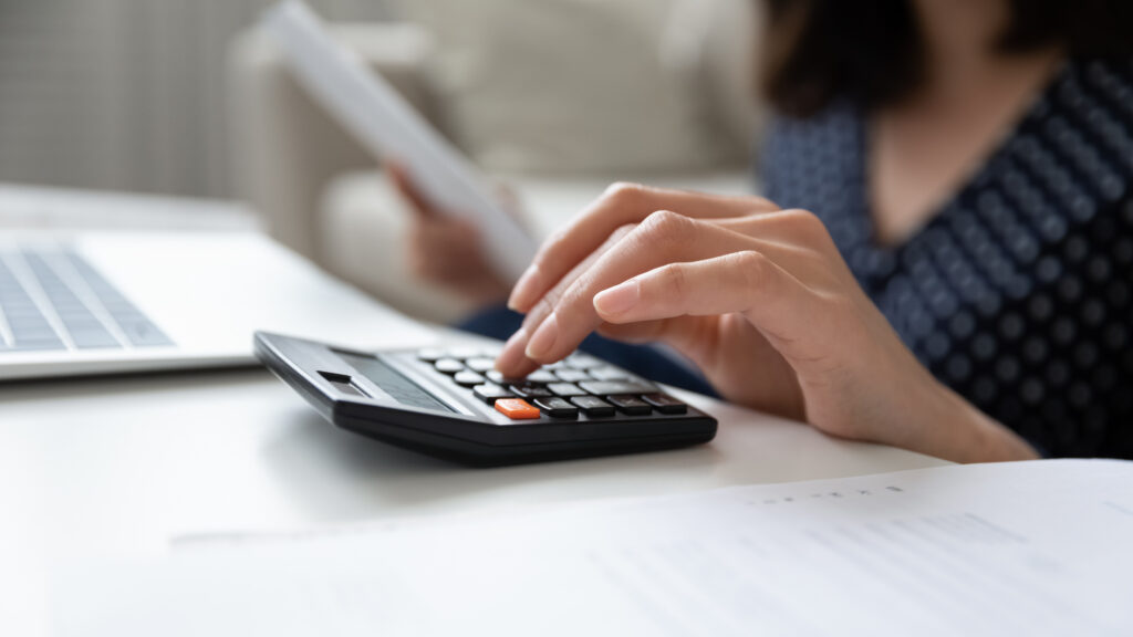 small business owner paying and calculating quarterly taxes
