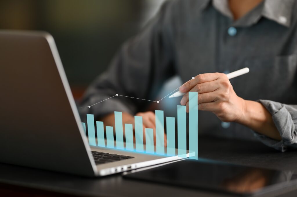 Businessman noting profit margin